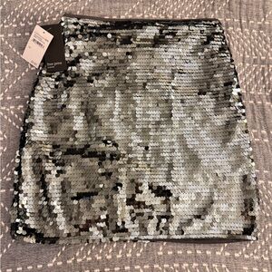 Grey sequin mini skirt, never worn but no tags! Free press brand . Size XS
